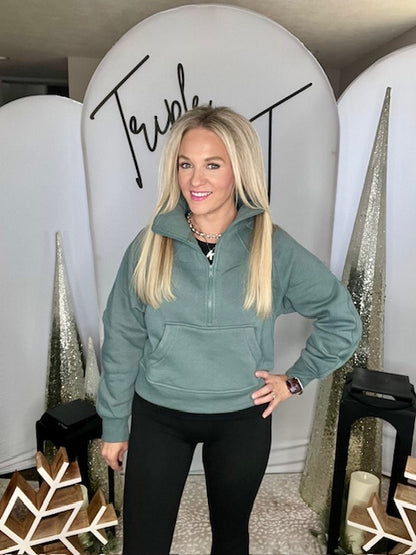 Fleece half zip kangaroo pocket sweatshirt